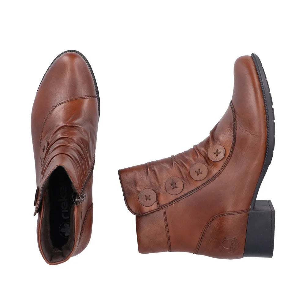Rieker 78659-22 women's brown leather ankle boots with side zip and decorative button details, chunky heel, and comfortable design.