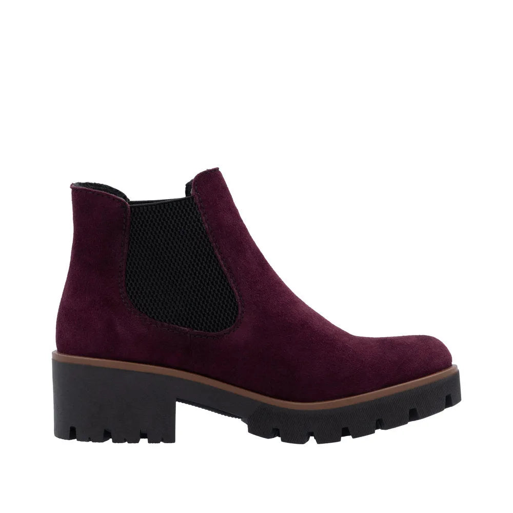 Rieker 79265-30 women's red suede slip-on ankle boots with chunky black sole and elastic side panels.