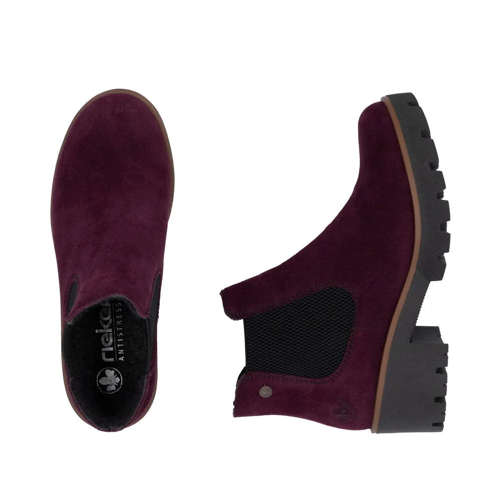 Rieker 79265-30 women's red suede slip-on ankle boots with black elastic side panels and chunky rubber soles.