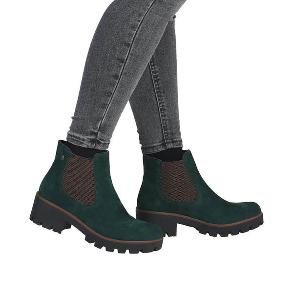 Rieker 79265-55 women's green suede slip-on ankle boots with chunky black soles and elastic side panels.