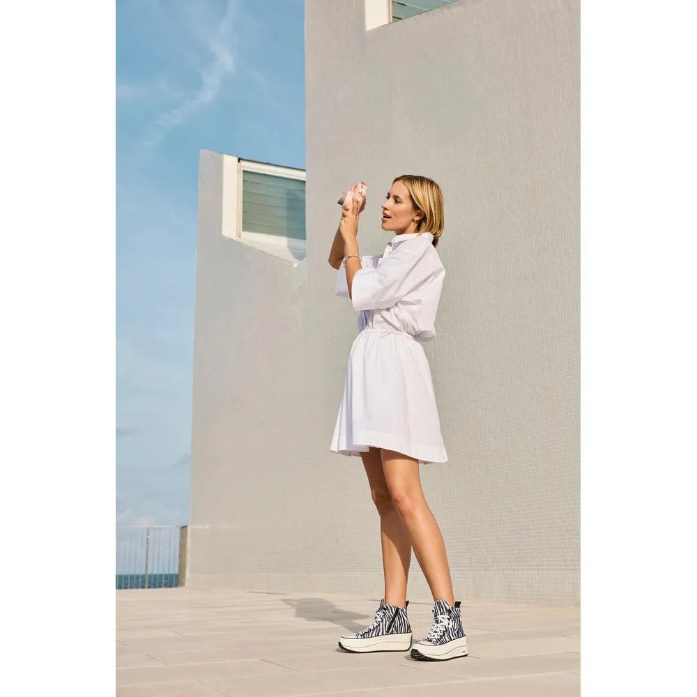 Women's zebra print textile vegan ankle boots with zip and lace, platform sole, stylish and modern design.