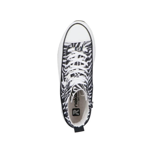 Zebra print vegan ankle boots with white laces, zip, and textured textile material, by Rieker.