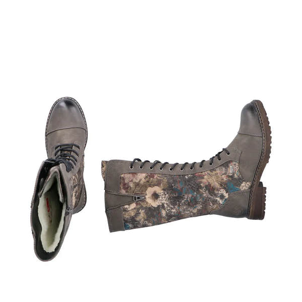 Rieker 94731-90 women's waterproof mid-calf boots with lace-up and zip closure, floral patterned design, and rugged sole.