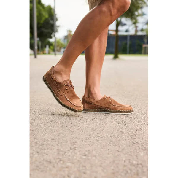 Rieker B5220-22 men's wide brown suede lace-up shoes, casual footwear, outdoors on pavement.