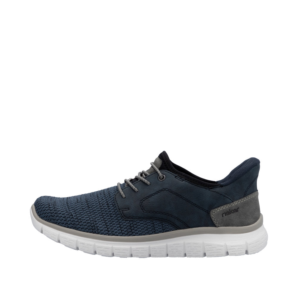 Rieker B6658-14 men's wide-fit midnight textile slip-on trainers with cushioned white sole.