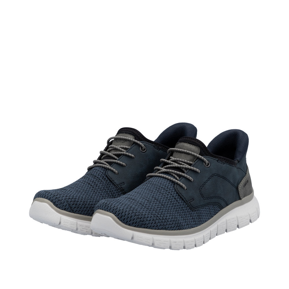 Rieker B6658-14 men's wide-fit midnight textile slip-on trainers with cushioned sole and lace-up design.