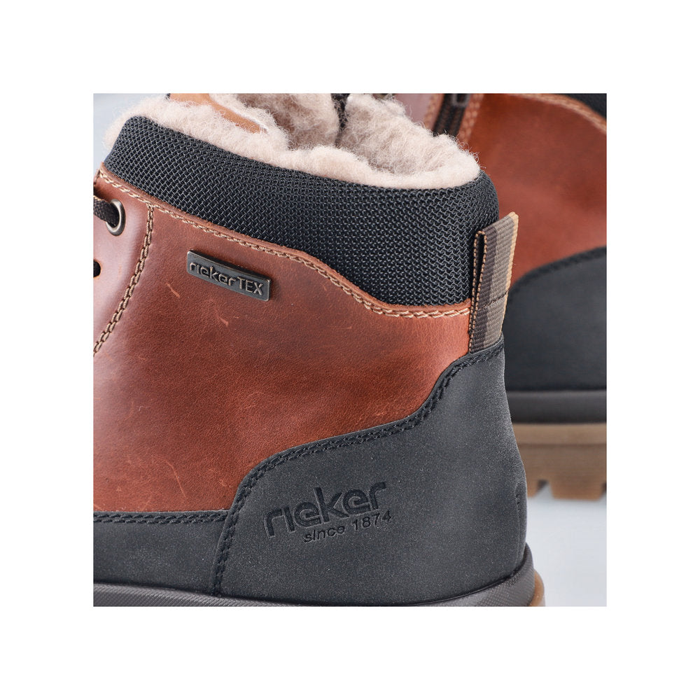 Rieker F7044-25 men's wide brown/black leather water resistant zip & lace ankle boots, lifestyle view.