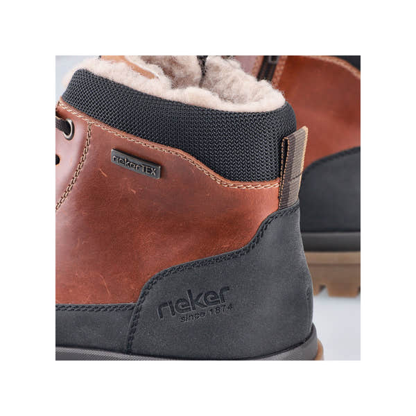 Rieker F7044-25 men's wide brown/black leather water resistant zip & lace ankle boots, lifestyle view.