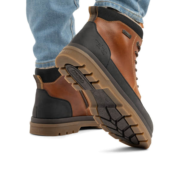 Rieker F7044-25 men's wide brown/black leather water resistant zip & lace ankle boots, lifestyle view 3 of 4.
