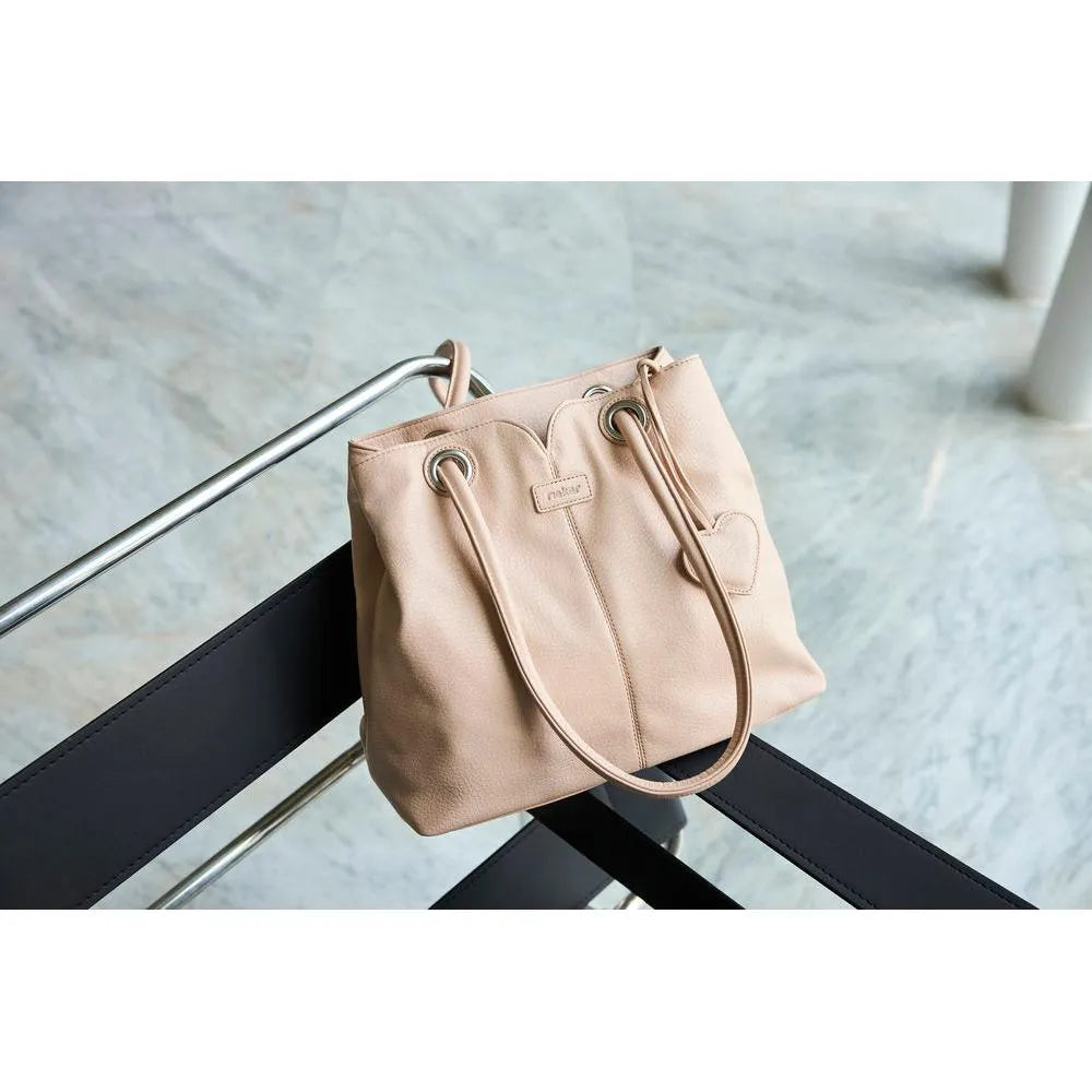 Rieker H1021-31 pink handbag with heart-shaped charm, leather strap, and minimalist design, stylish accessory for women.