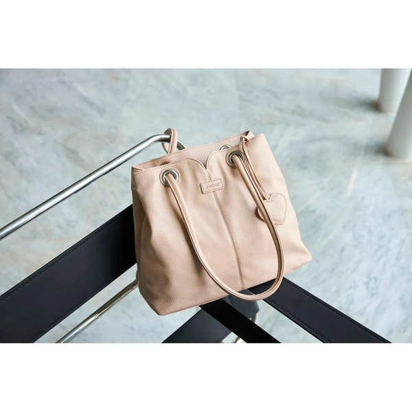 Rieker H1021-31 pink handbag with heart-shaped charm, leather strap, and minimalist design, stylish accessory for women.