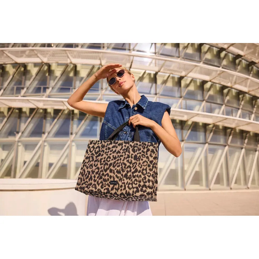 Rieker H1070-90 leopard print tote bag, stylish animal pattern, large capacity, casual accessory for women.