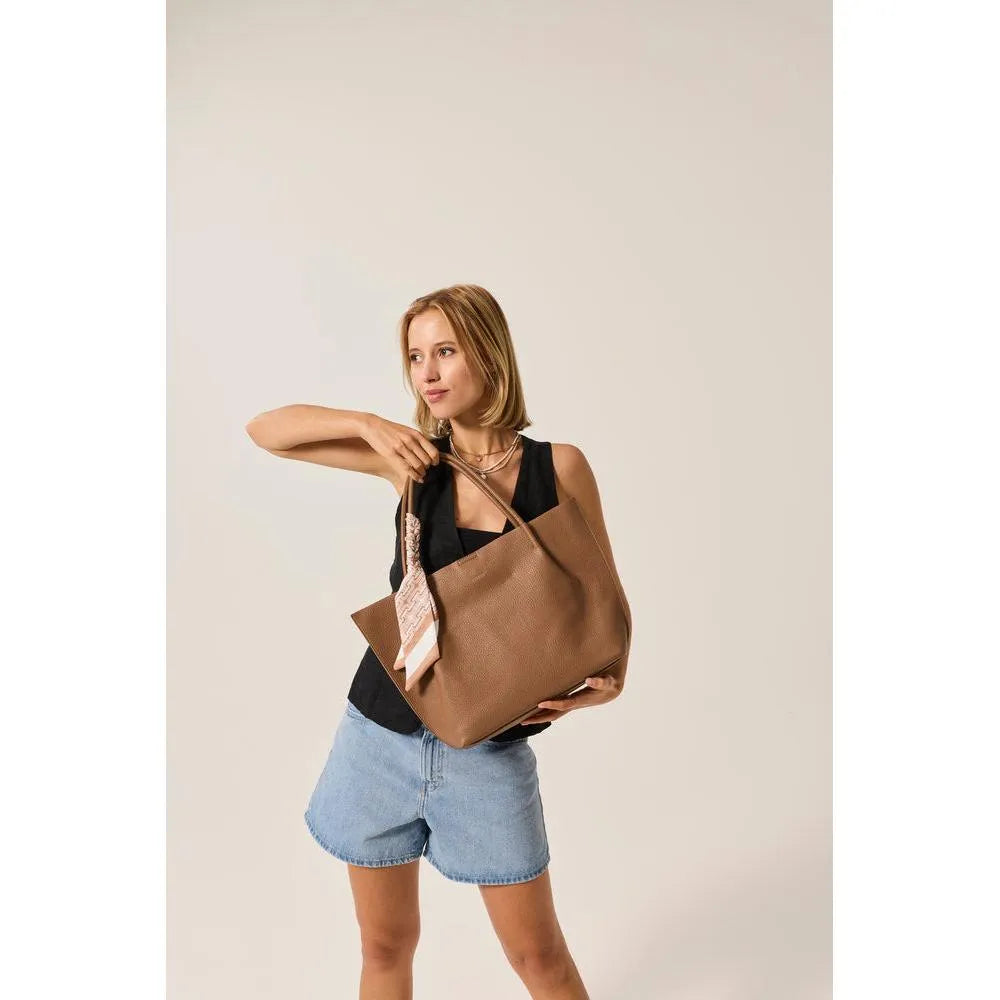 Rieker H1399-24 taupe handbag with shoulder strap, casual style, large spacious design, and textured faux leather material.
