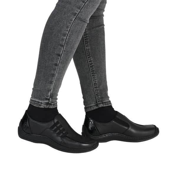 Rieker L1777-00 women's black leather slip-on shoes, comfortable casual footwear with stylish design and slip-resistant sole.