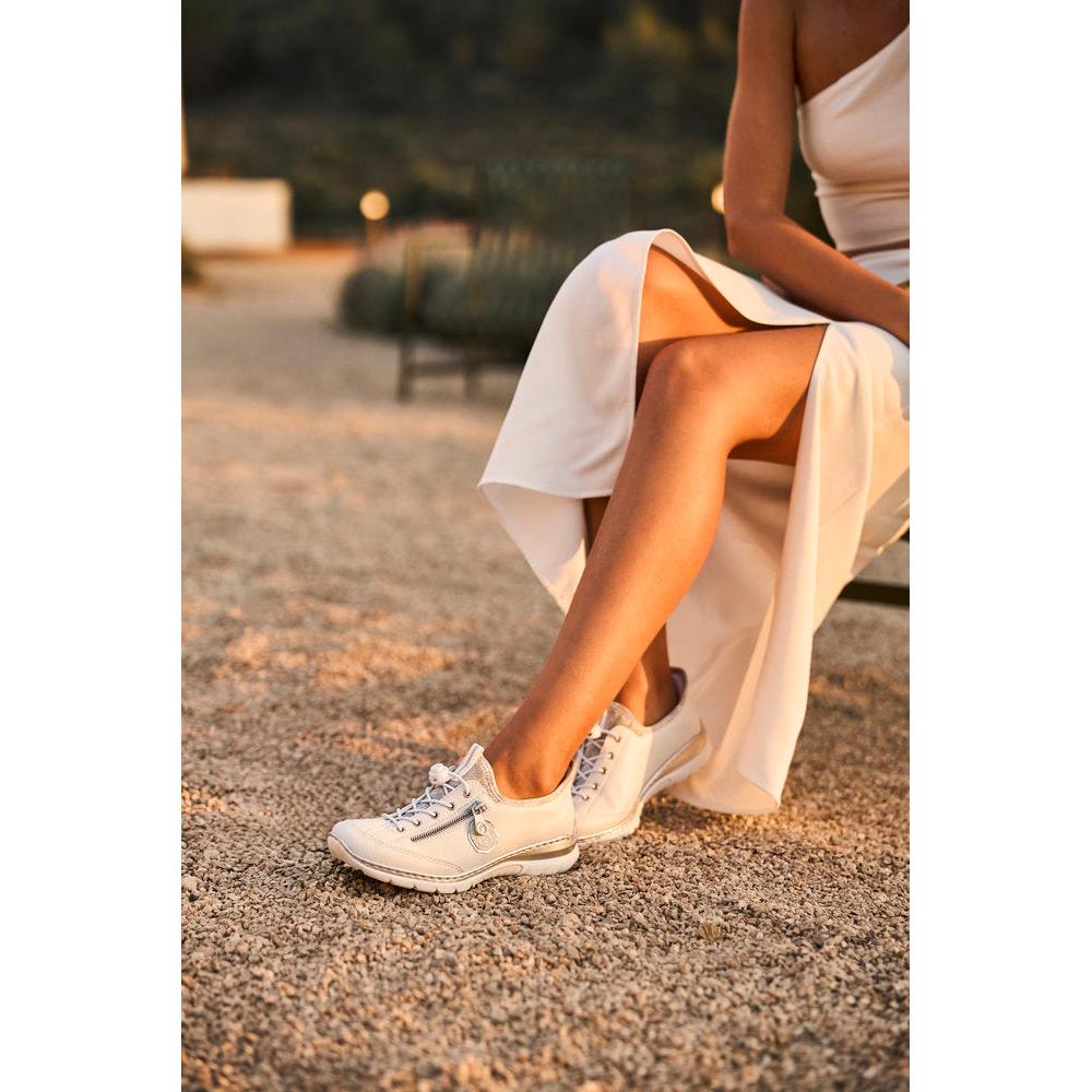 Rieker L32F1-80 women’s white elasticated casual shoes, comfortable slip-on sneakers for everyday wear.