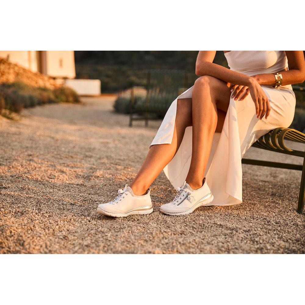 Rieker L32F1-80 women's white elasticated casual shoes, lightweight and comfortable for summer wear.