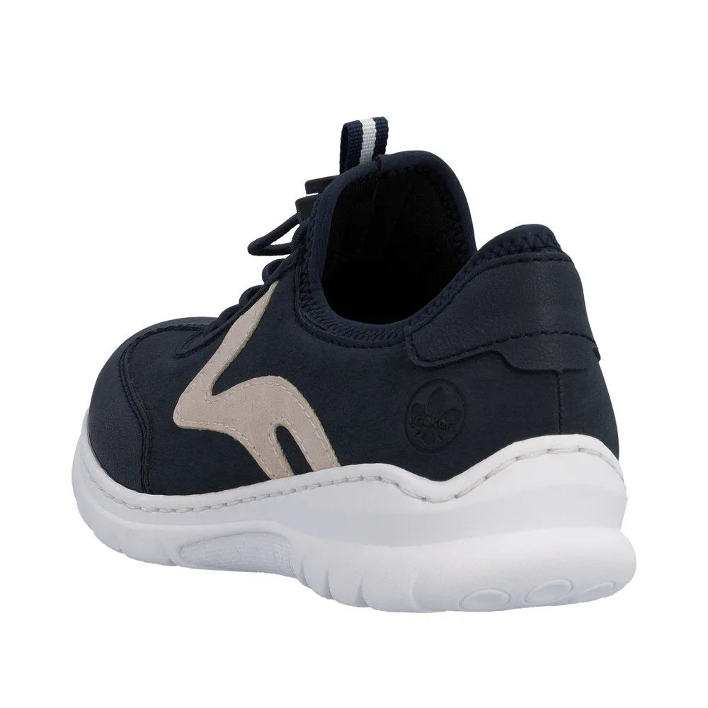 Navy blue Rieker ladies' elasticated sneaker with beige detailing and a white sole.