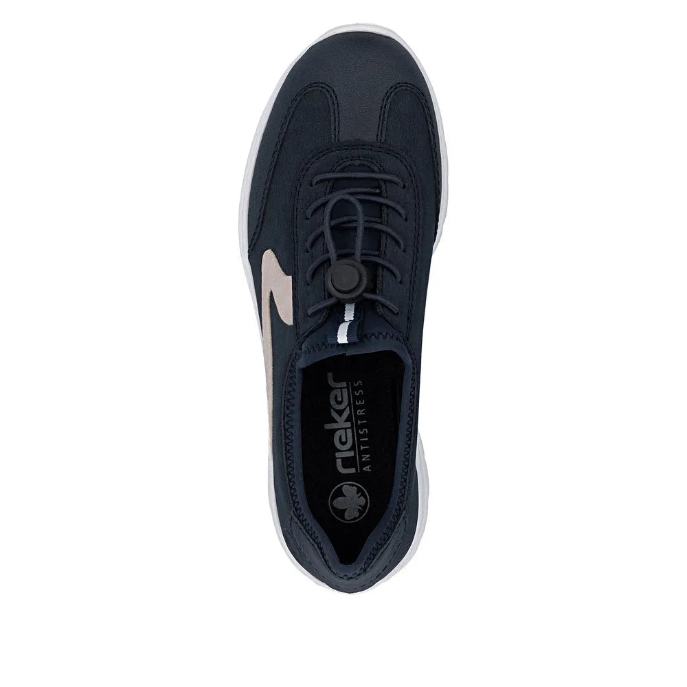 Navy blue Rieker elasticated fastener shoe with rose detailing, white sole, and black lace lock, made of textured material.
