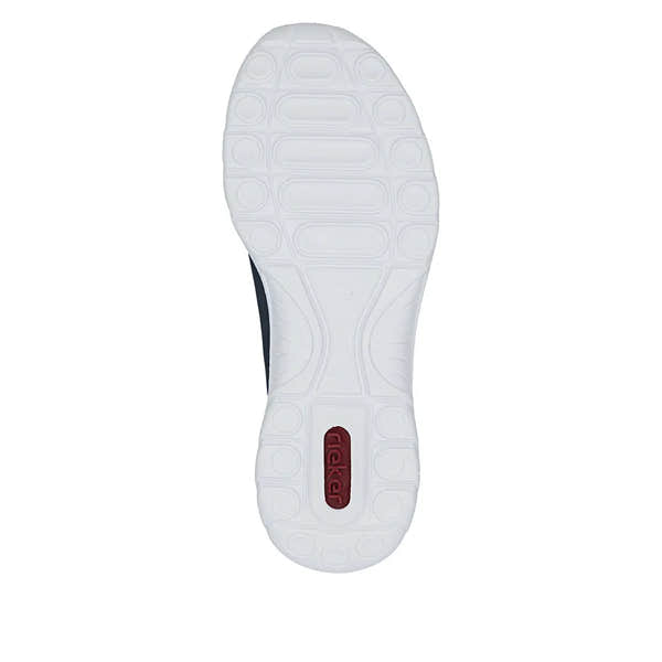 White and navy elasticated fastener women's shoes with a textured sole and "Rieker" branding on the bottom.