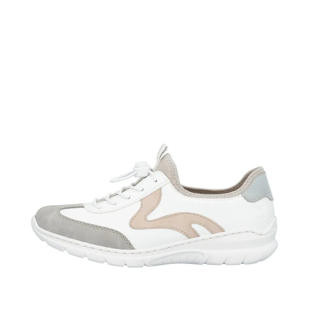 White and beige multi-elasticated ladies' shoe with suede accents, cushioned sole, and a slip-on style.
