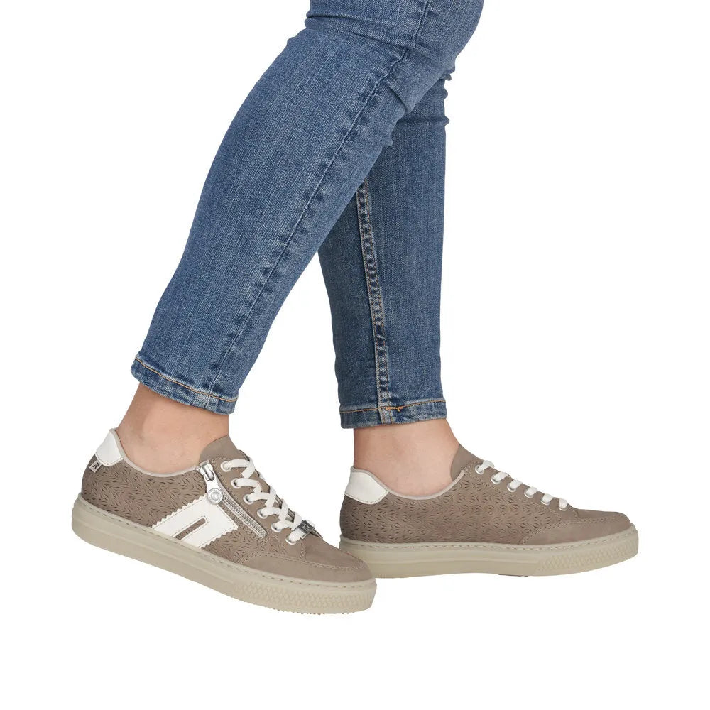 Rieker L5903-20 ladies' camel suede sneakers with zipper, lace-up design, white accents, and textured material.