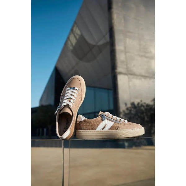 Rieker L5903-20 ladies camel suede sneakers with zip, lace-up detail, white accents, and textured side panel.