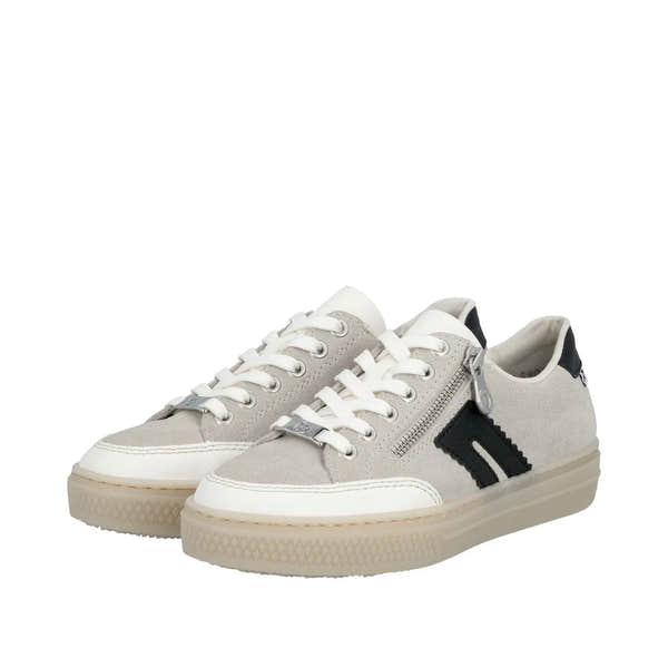 Rieker L5903-40 ladies off-white suede sneakers with lace-up, zipper detail, black accents, and chunky rubber sole.