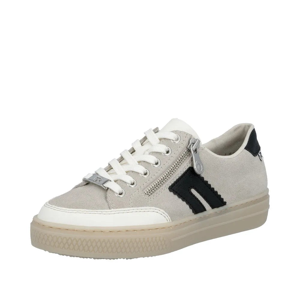 Rieker L5903-40 beige suede lace-up sneaker with black accents and side zipper, rubber sole, and sporty style.