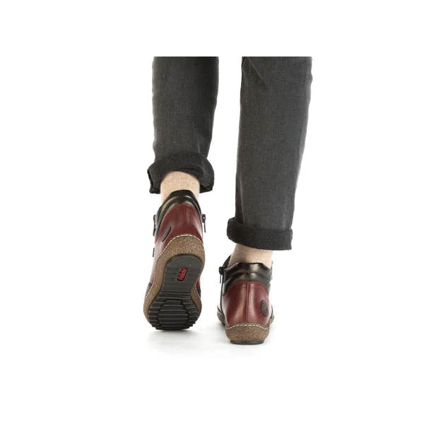 Rieker L7500-35 Ladies Red Water-Resistant Ankle Boots with Zip and Lace Closure, supportive sole, and stylish design.