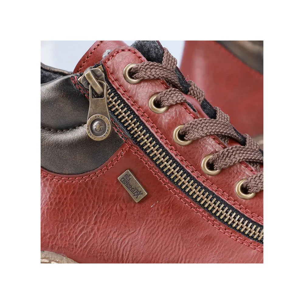 Rieker L7500-35 women's red water-resistant ankle boots with lace-up and zip closure, featuring metal eyelets and zipper detail.