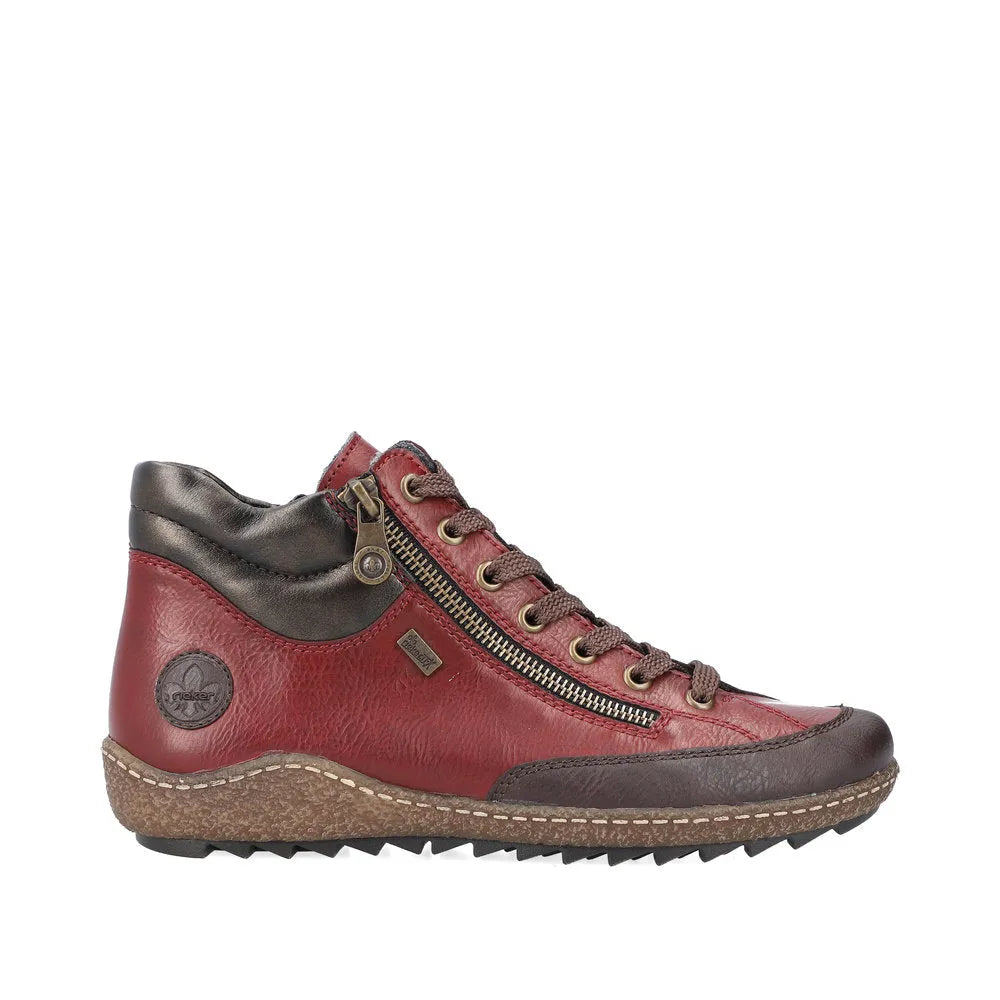Rieker L7500-35 women's red water-resistant ankle boots with zipper, lace-up detail, and rugged sole.