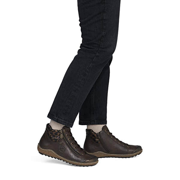 Rieker L7514-25 women's dark brown water resistant zip & lace ankle boots, on-foot lifestyle view.