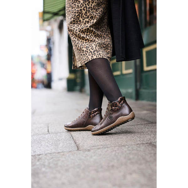 Rieker L7514-25 women's dark brown water resistant zip & lace ankle boots, lifestyle view 5 of 5.