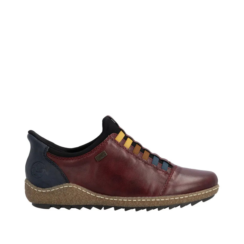 Rieker L7562-35 Ready2Go women's red leather water-resistant slip-on shoes with colorful laces and cushioned sole.