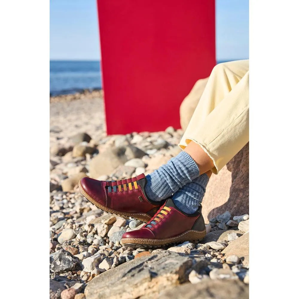 Rieker L7562-35 Ready2Go women's red leather water-resistant slip-on shoes with colorful laces, casual beach look.
