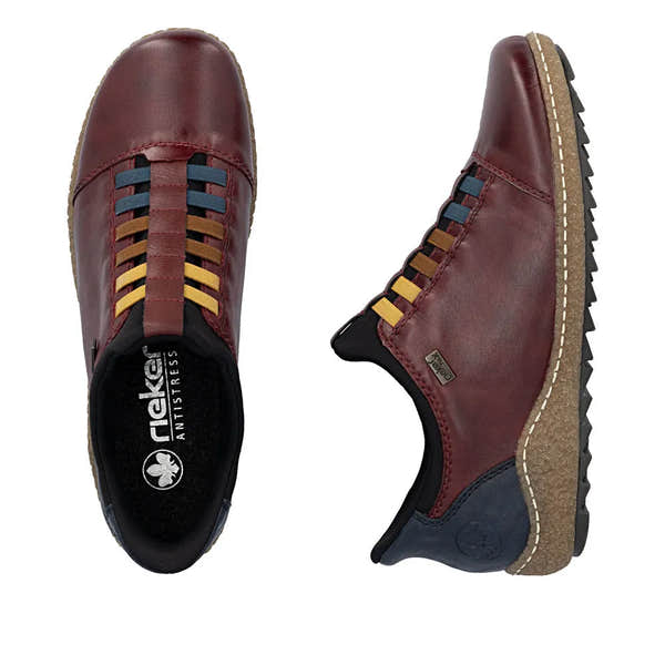 Rieker L7562-35 Ready2Go women's red leather water-resistant slip-on shoes with colorful laces and rugged sole.