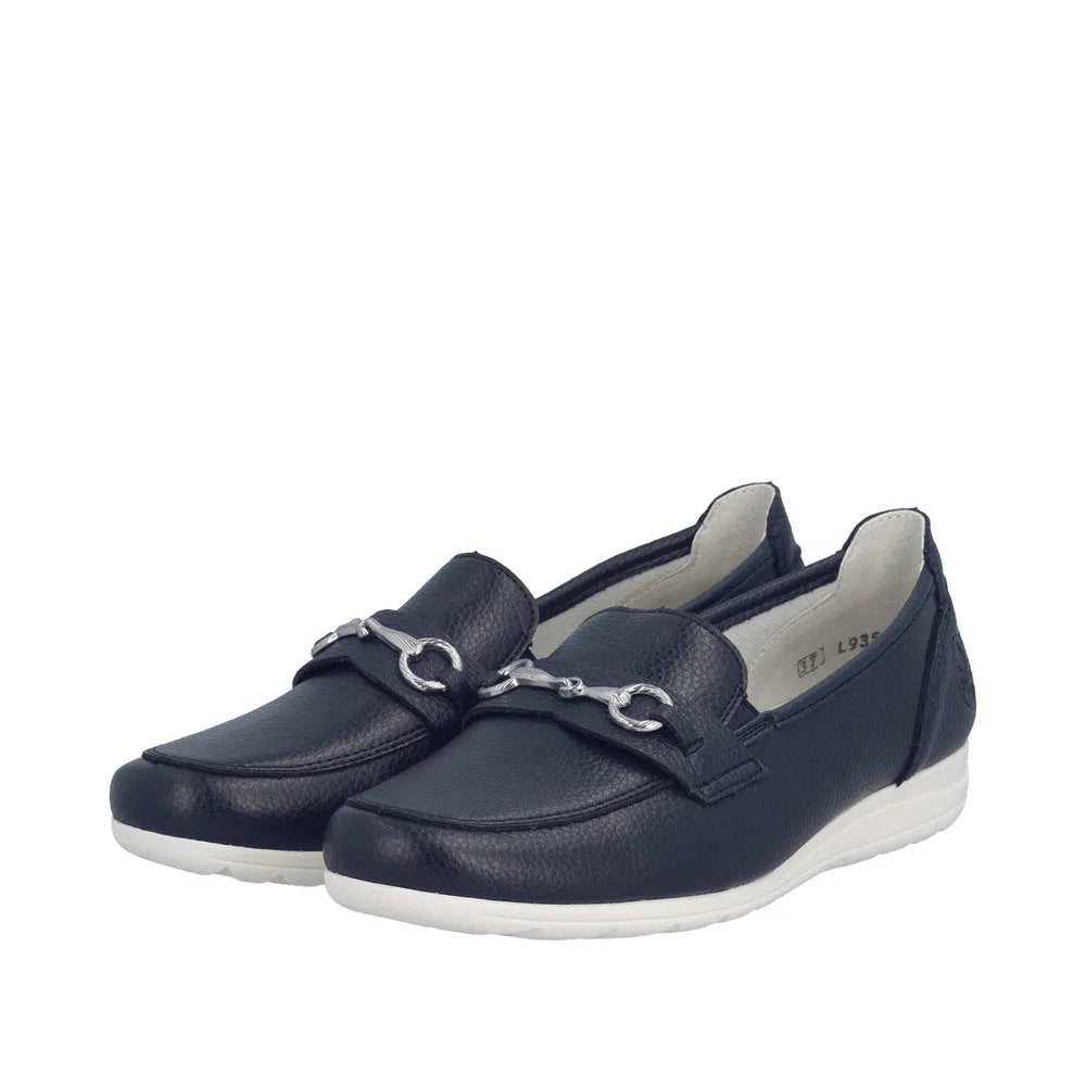 Rieker L9355-14 navy leather slip-on shoes with silver chain detail, white sole, and cushioned interior.