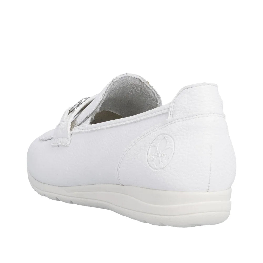 White leather slip-on women's shoes with a textured finish, round toe, and embossed brand logo on the side.