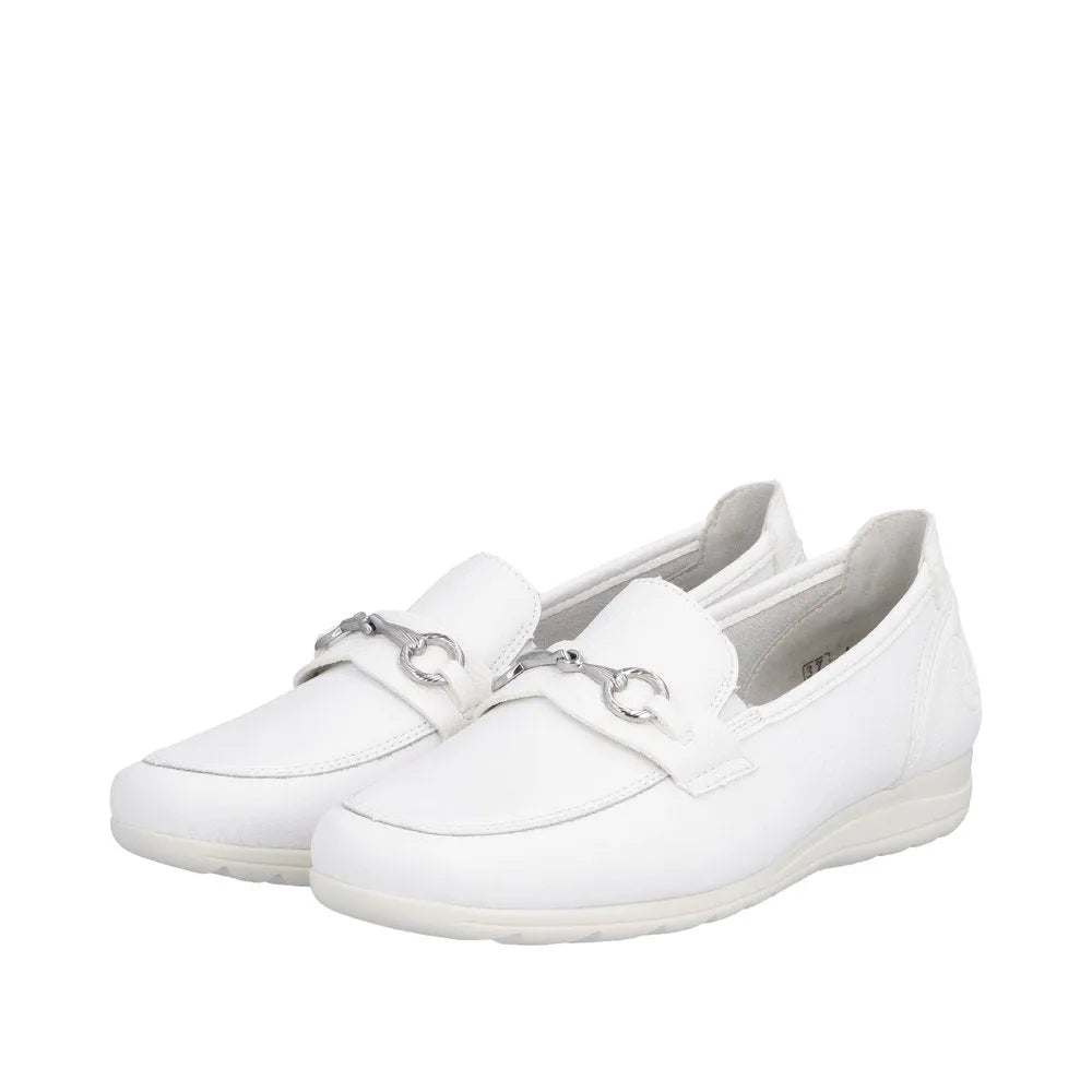 White leather slip-on shoes with silver horsebit detail, low heel, and subtle textured finish.