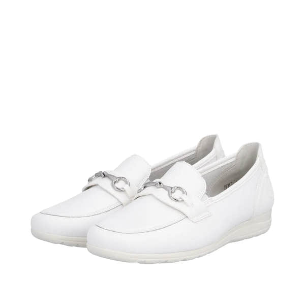 White leather slip-on shoes with silver horsebit detail, low heel, and subtle textured finish.