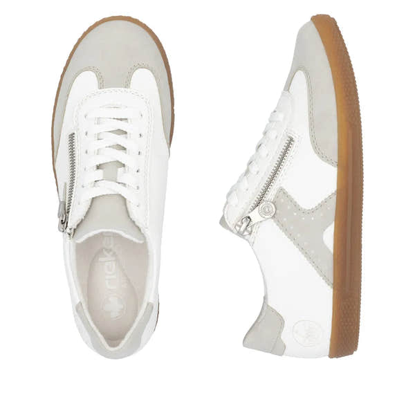 Rieker L9700-80 women's white sneakers with zipper and lace-up front, beige accents, and gum sole.