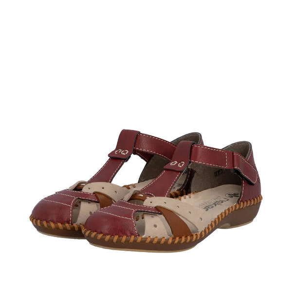 Red leather wide-fit sandal with touch-fastening straps, open toe, cushioned beige insole, and braided sole detail.