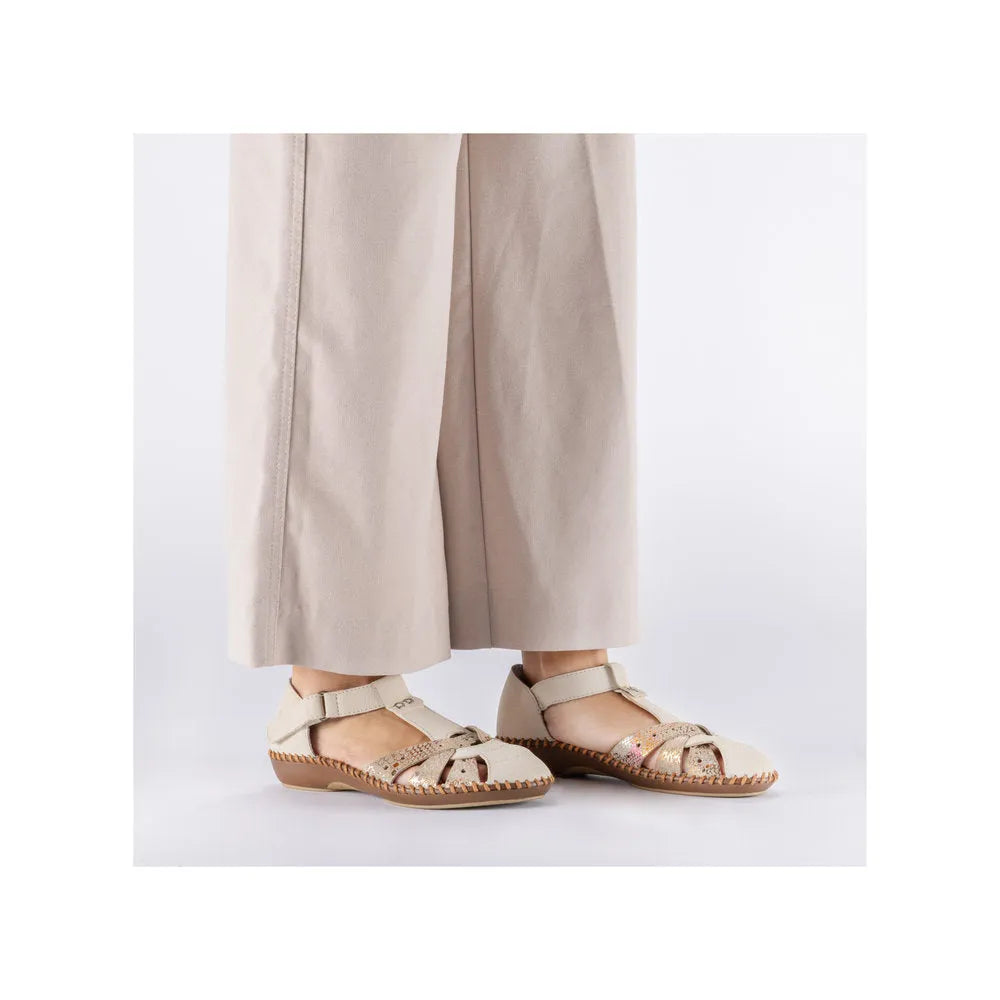 Rieker M1655-62 women's beige wide fit touch-fastening sandals with open toe and low heel.