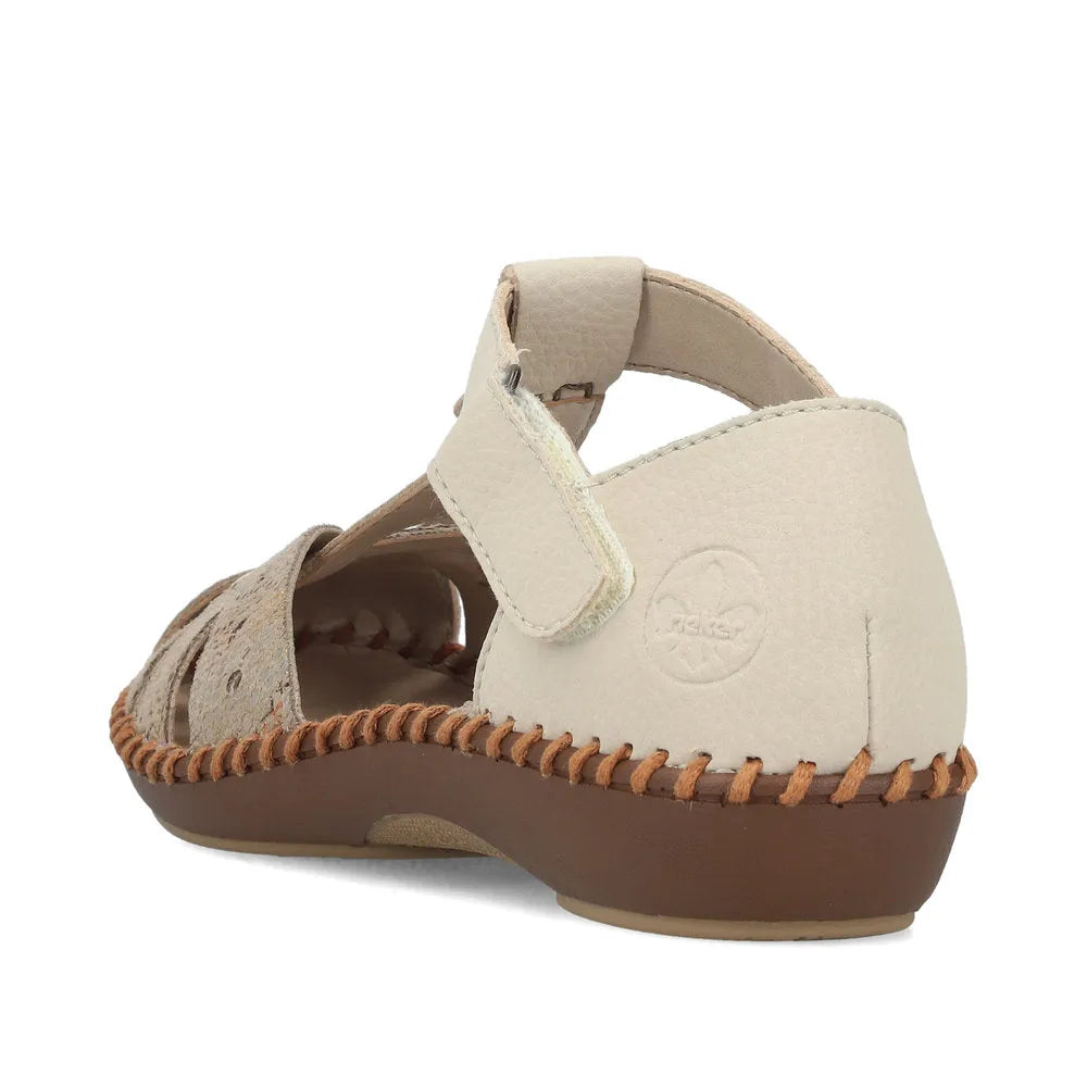 Rieker M1655-62 ladies wide beige touch fastening sandals with closed heel, cut-out design, and cushioned sole.