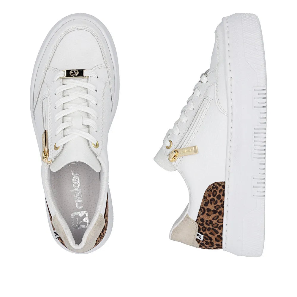 White leather trainers with leopard print accents, gold zippers, lace-up and zip fastening, branded details, and a chunky sole.