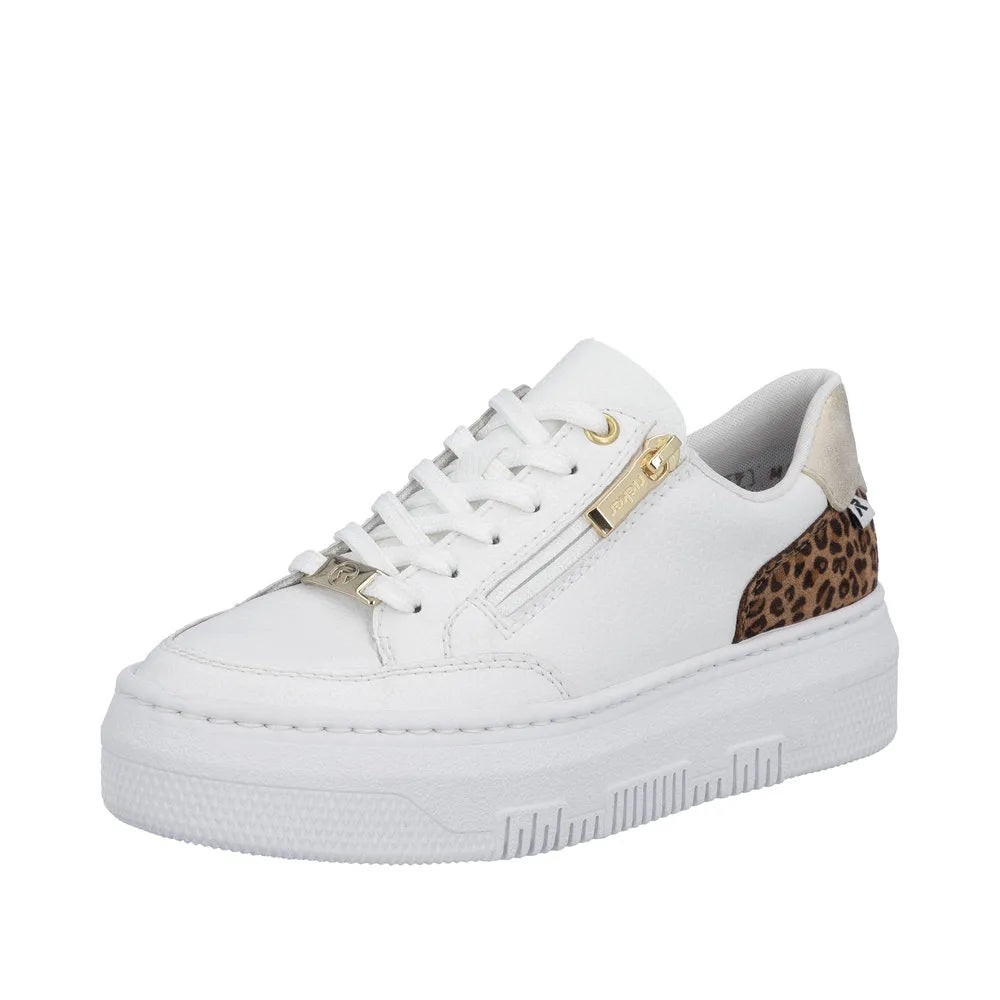 White leather sneaker with leopard print accents, gold zippers, lace-up front, and thick white sole.