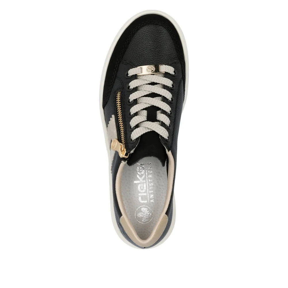 Rieker M1912-00 women's multi leather zip and lace trainers with black, beige, and white accents, featuring gold hardware and breathable interior.