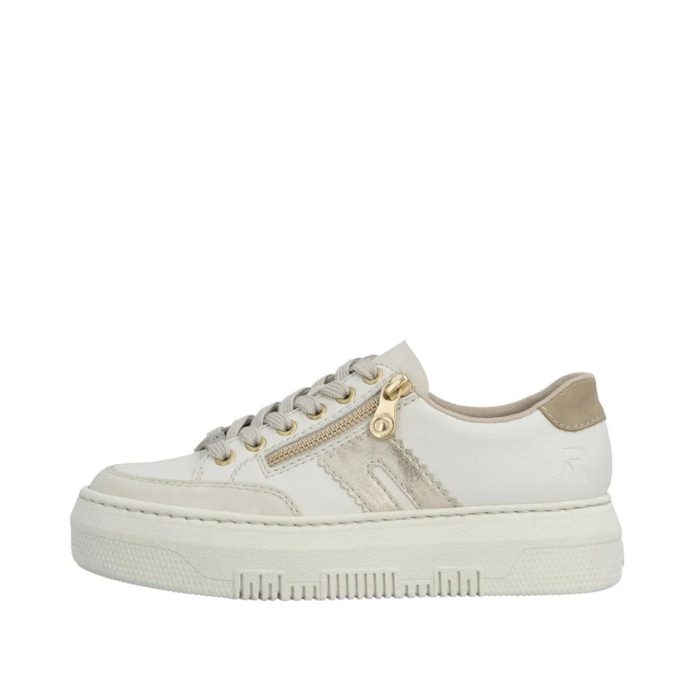 Off-white leather trainers with gold zipper, lace-up front, beige accents, and chunky sole.