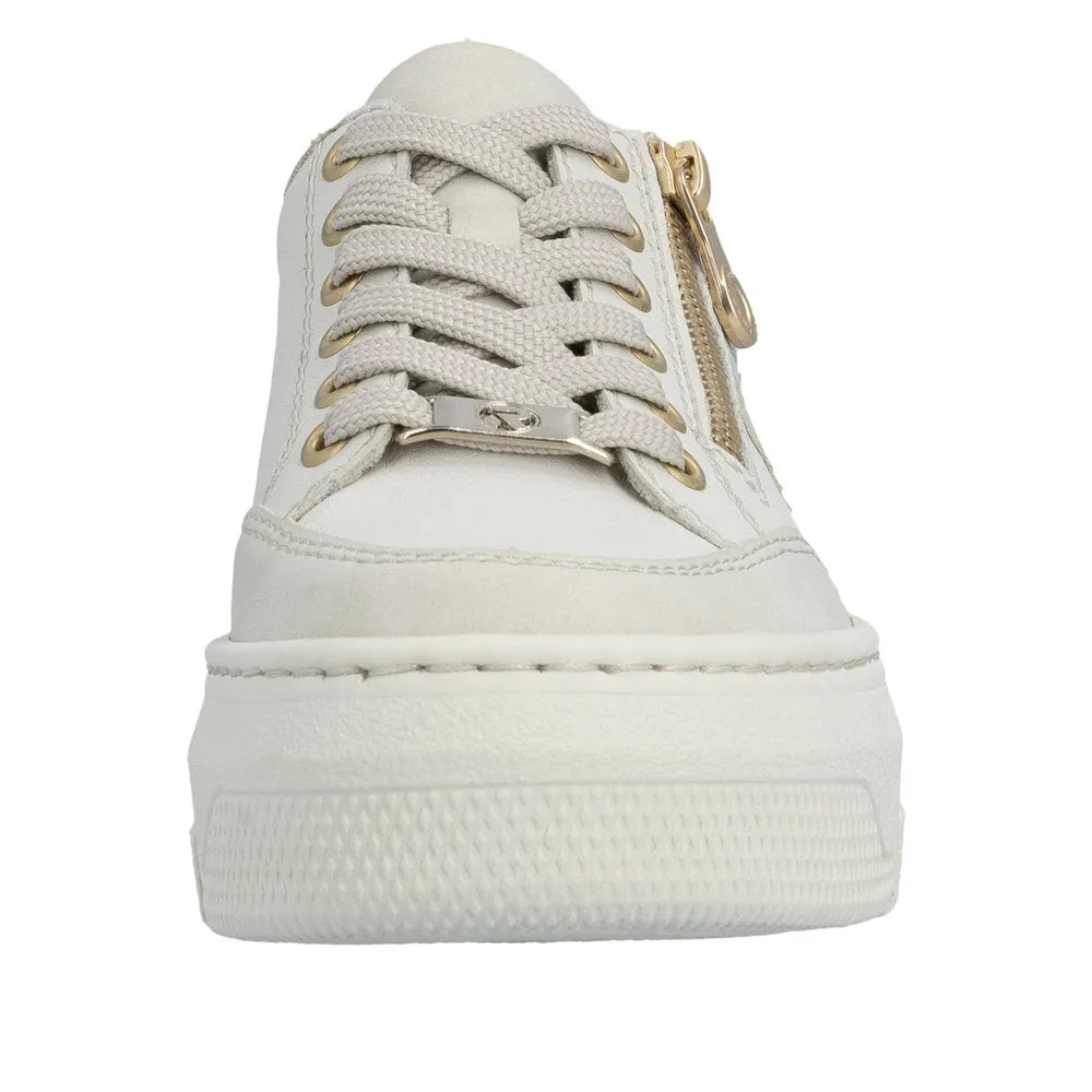 Off-white leather women's trainer with lace-up front, gold eyelets, and side zipper detail.