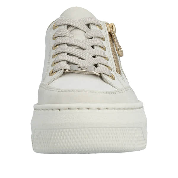 Off-white leather women's trainer with lace-up front, gold eyelets, and side zipper detail.